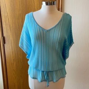 Pretty turquoise tie-waist blouse